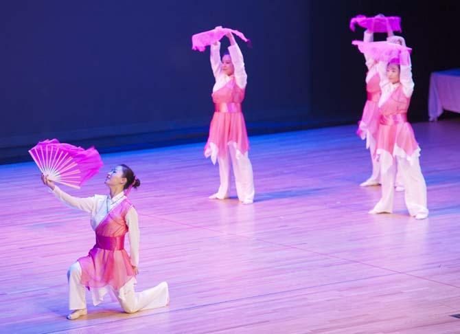 Members of the Yangguang Chinese Dance Troupe perform a Moonlight Dance Feb. 9, 2013 during the Chinese New Year celebration in the Union Theater.
 