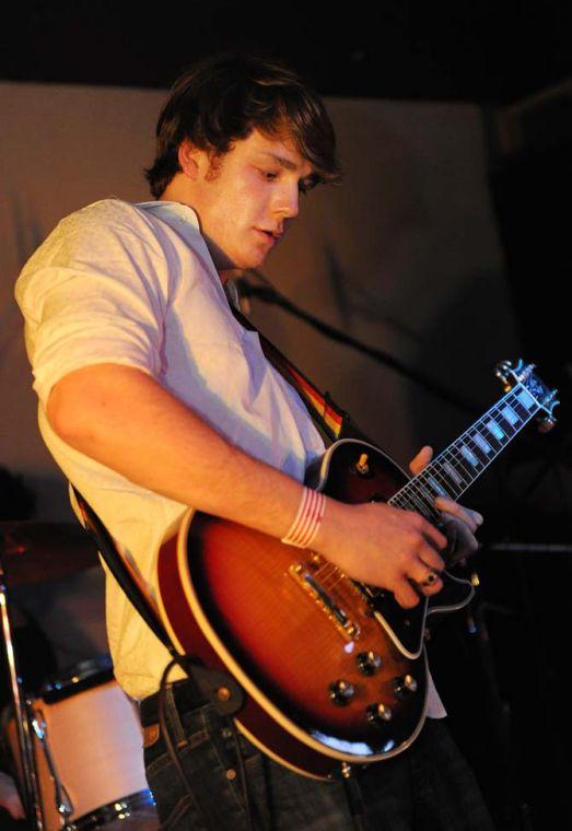 Electrical engineering freshman and Stone Rabbits lead guitarist Logan Sellers plays during a show Saturday, Feb. 2, 2013 at Shady's.
 