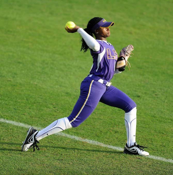 LSU sophomore outfielder A.J. Andrews throws a ball Friday, Feb. 8, 2013 during the tiger's first game of the season against North Carolina at Tiger Park.
 