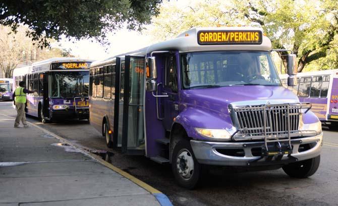 Busses pick up students on Feb. 7, 2013 outside of the Journalism building.
 