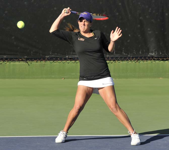 LSU sophomore Mary Jeremiah hits the ball Saturday, Feb. 16 in the Lady Tigers' match against McNeese State University.
 