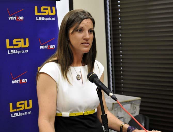 Softball coach Beth Torina listens to an interview question Monday, Feb. 4, 2013, during LSU's softball media day.
 