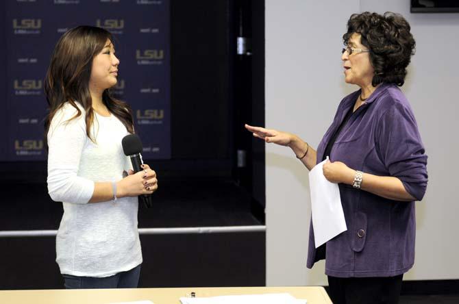 Dr. Shirley White (right) interviews sophomore gymnast Randi Lau (left) Feb. 5, 2013 in the Athletic Administration Building to help prepare her for future media interactions.
 