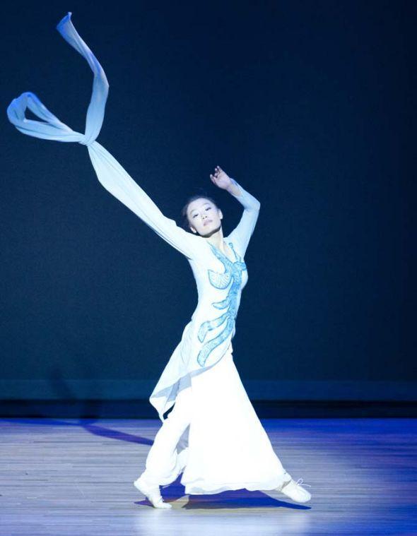 A member of the Yangguang Chinese Dance Troupe performs a classical Water Poem dance Feb. 9, 2013 during the Chinese New Year celebration in the Union Theater.
 