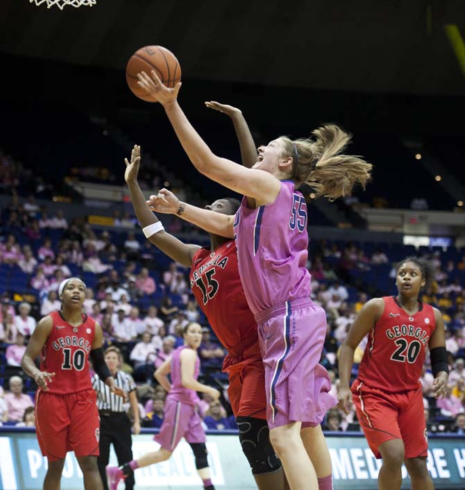 LSU junior forward Theresa Plaisance (55) goes in for a shot on Sunday, Feb. 10 during the Tiger's 62-54 win against the Bulldogs in the PMAC.
 