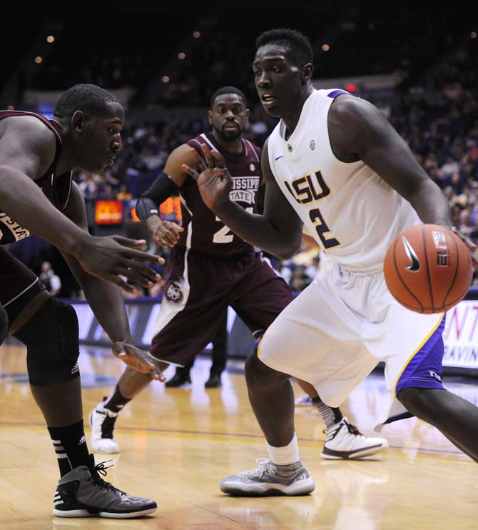 LSU sophomore forward Johnny O'Bryant III avoids a defender Saturday, Feb. 16, 2013 in the Tigers' 80-68 victory over the Bulldogs.
 