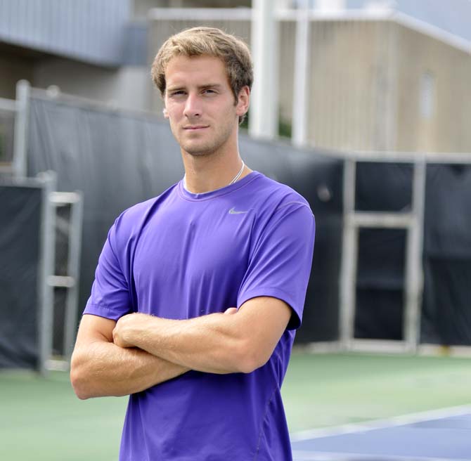 Senior LSU tennis player Mark Bowtell stands on the tennis courts at W.T. "Dub" Robinson Stadium on Tuesday, Feb. 5, 2013.
 