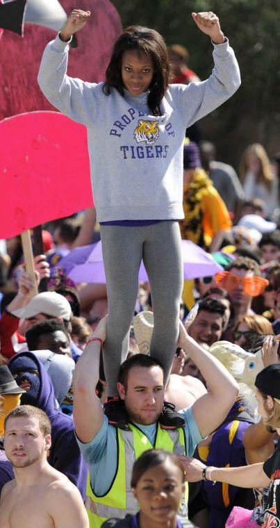 An LSU student stands on the shoulders of a fellow student on Feb. 15, 2013 during the LSU Harlem Shake in front of the PMAC.
 