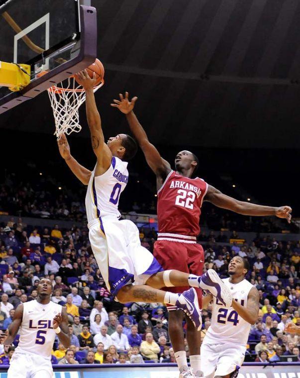 LSU senior guard Charles Carmouche (0) attempts a layup Wednesday Feb. 27, 2013 during the Tigers' 65-60 victory against Arkansas in the PMAC.
 