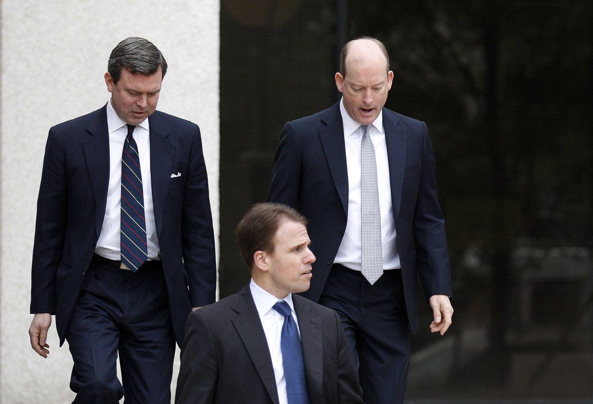 Lamar McKay, former president of BP America and current chief executive of BP's Upstream unit, leaves Federal Court after testifying in New Orleans, Monday, Feb. 25, 2013. McKay testified Tuesday that BP and its contractors share responsibility for preventing blowouts like the Macondo well blowout and rig explosion off Louisiana that killed 11 workers on April 20, 2010, spawning the massive spill. (AP Photo/Bill Haber)