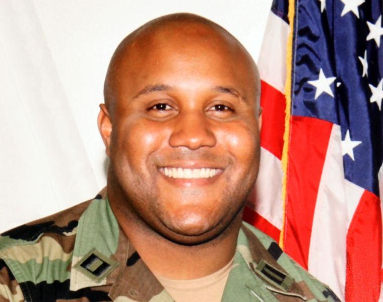 FILE - This undated file photo provided by the Los Angeles Police Department shows suspect Christopher Dorner, a former Los Angeles police officer. A law enforcement official tells The Associated Press, Tuesday, Feb. 12, 2013, that a charred body inside the ruins of a mountain cabin that went up in flames is believed to be that of Dorner, suspected in four killings. Other agencies say a body has yet to be found. (AP Photo/Los Angeles Police Department, File)
 