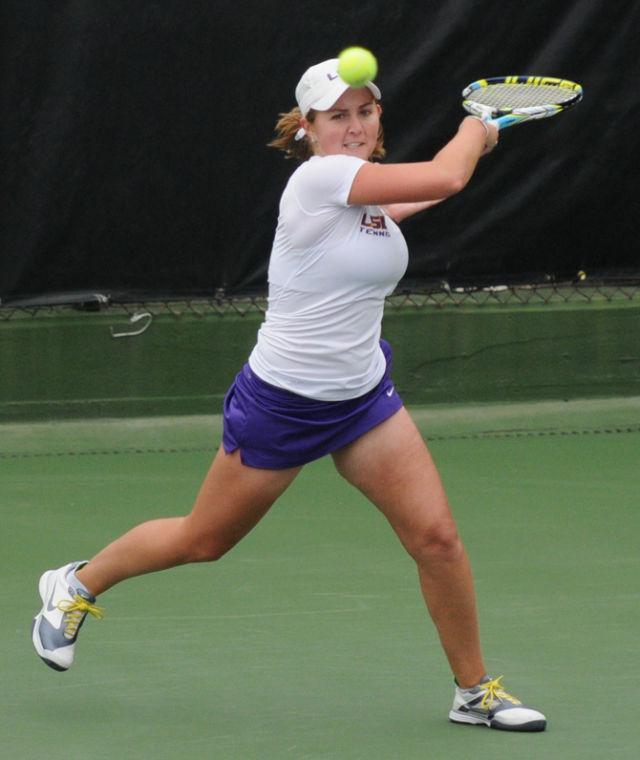 LSU senior Ebie Wilson forehands the ball Saturday, Feb. 23 during the Tigers' singles matches against the Nicholls State Colonels at W.T. "Dub" Robinson Tennis Stadium.
 