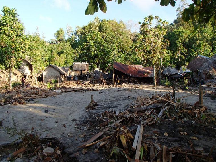 The destroyed Venga village following a Tsunami Wednesday Feb. 6, 2013, in Temotu province, Solomon Islands. The damage seen is part the survey by the assessment crew of the aid organisation World Vision. Solomon Islands authorities say at least four people are missing and presumed dead after an earthquake triggered a tsunami. Waves of up to 5 feet hit the western side of Santa Cruz Island and damaged up to 80 properties. Dozens of aftershocks have followed. Other tsunami warnings are canceled. (AP Photo / World Vision)
 