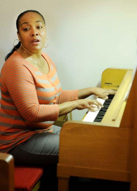 Music director Tirzah Smith leads the collegiate choir at practice in the Bethel African Methodist Episcopal Church on Feb. 2, 2013.
 