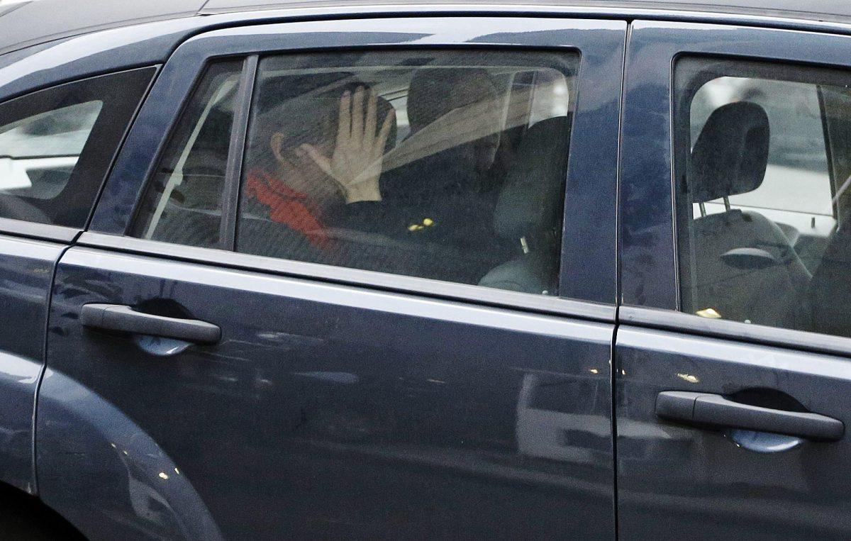 Kathleen Mangan, right, is driven from federal court Monday, Feb. 25, 2013, in New York. Struggling to stay composed, the estranged wife of a New York City police officer testified Monday that she was shocked to find he had visited a website featuring a photo of a dead woman and other gruesome images &#8212; a discovery that led to a federal prosecution accusing him of plotting to abduct, torture and eat dozens of women. Monday, Feb. 25, 2013, in New York. (AP Photo/Frank Franklin II)