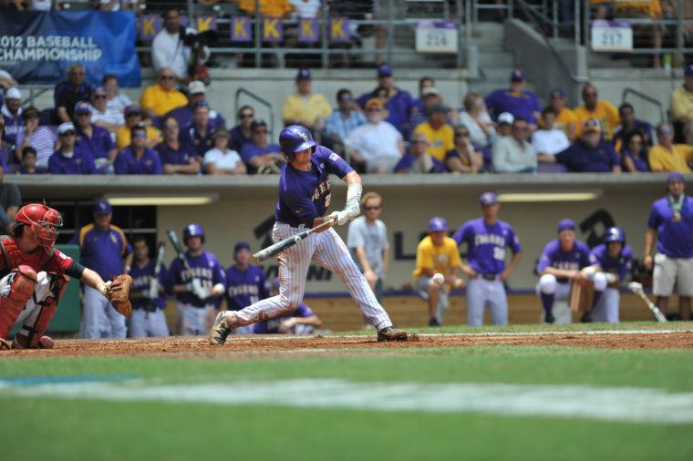 Junior catcher Ty Ross swings at a low pitch during Saturday, June 9, 2012 against Stony Brook.
 