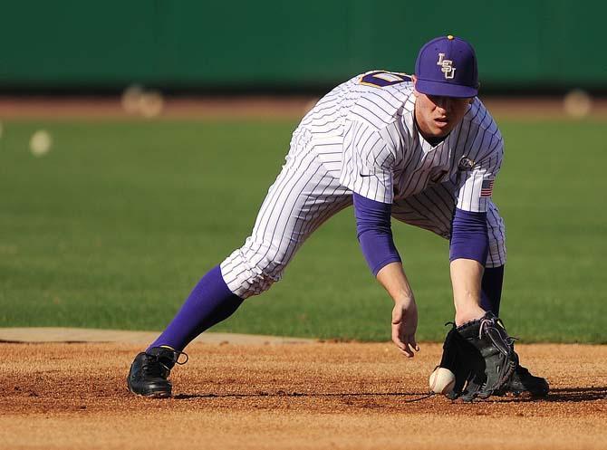 LSU freshman infielder Alex Bregman (30) catches a ground ball Feb. 5, 2013 during baseball practice at Alex Box Stadium.
 