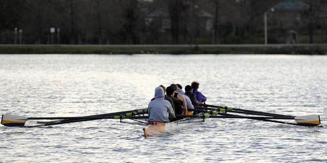 Members of the LSU Rowing Club return to the dock at the end of their early morning practice on Thursday, Feb. 20, 2013 at University Lake.
 