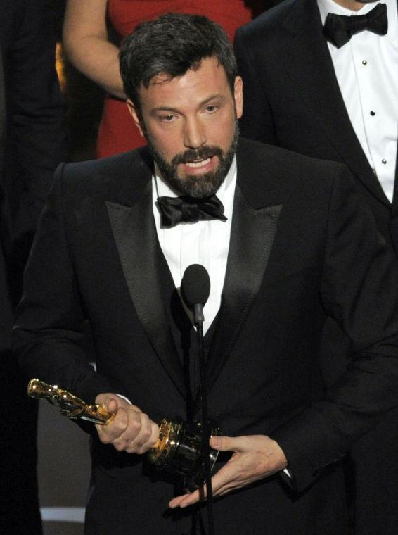 Director/producer Ben Affleck accepts the award for best picture for "Argo" during the Oscars at the Dolby Theatre on Sunday Feb. 24, 2013, in Los Angeles. (Photo by Chris Pizzello/Invision/AP)
 