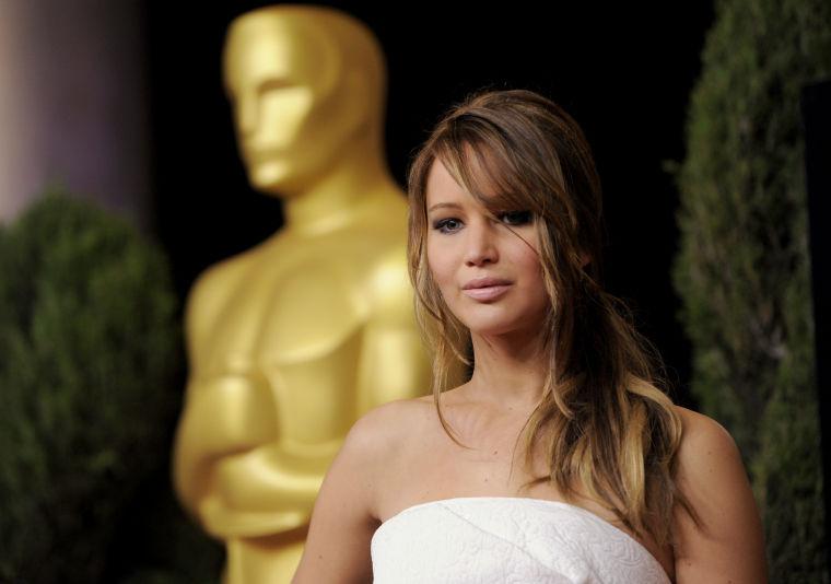 Jennifer Lawrence, nominated for best actress in a leading role for "Silver Linings Playbook," arrives at the 85th Academy Awards Nominees Luncheon at the Beverly Hilton Hotel on Monday, Feb. 4, 2013, in Beverly Hills, Calif. (Photo by Chris Pizzello/Invision/AP)
 