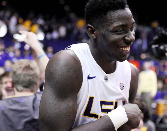 LSU sophomore forward Johnny O'Bryant III celebrates the Tigers' 97-94 triple overtime victory against the Crimson Tide on Saturday, Feb. 23, 2013. O'Bryant finished with 24 points and 10 rebounds.
 