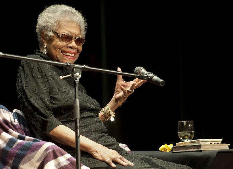 Maya Angelou recites poetry and tells stories of her personal experiences to the crowd gathered in Randolph College's Smith Hall Theatre in Lynchburg, Va., on Tuesday Jan. 29, 2013. (AP Photo/The News &amp; Advance, Sam O'Keefe)
 