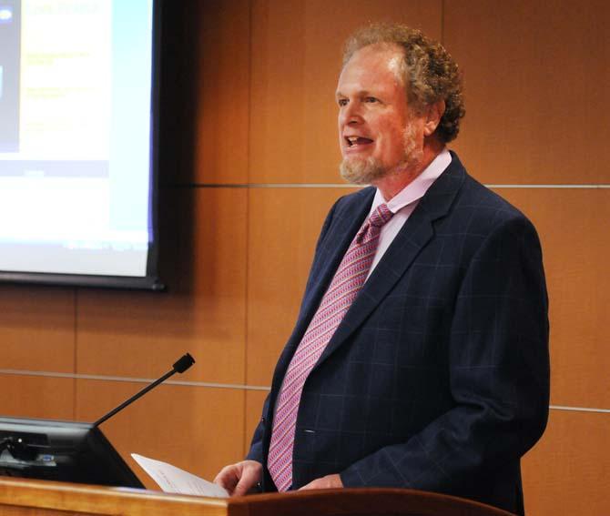 Faculty Senate President Kevin Cope opens the meeting on Feb. 18, 2013, in the Student Union Capital Chamber.
 