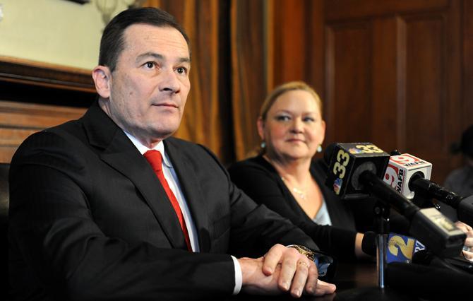 Former Baton Rouge Police Department Chief Dewayne White and his attorney Jill Craft listen Thursday, Feb. 7, 2013 to questions from reporters during a press conference held at 509 St. Louis St. in downtown Baton Rouge.
 