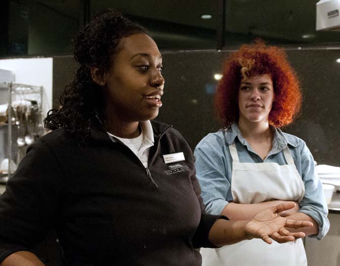 Viking cooking instructor Raine Bayyan (left) talks about different kinds of rouxs and how to make them with LSU creative writing sophomore Samantha Bares (right) listening intently at the gumbo Viking cooking class at the Hilton Hotel on Jan. 31, 2013.
 