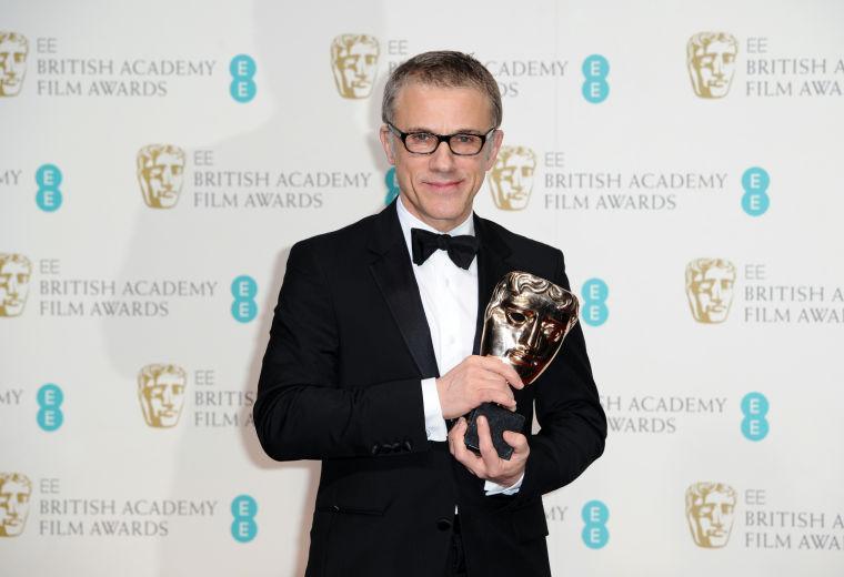 Austrian-German actor Christoph Waltz poses with the award for best supporting actor for his role in "Django Unchained" backstage at the BAFTA Film Awards at the Royal Opera House on Sunday, Feb. 10, 2013, in London. (Photo by Jonathan Short/Invision/AP)
 