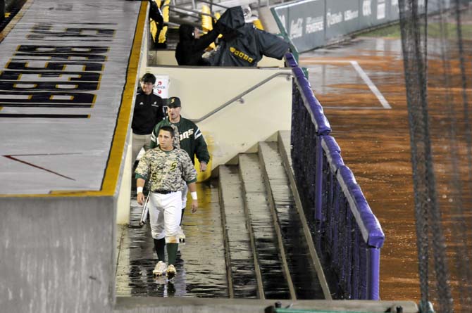 Southeastern sophomore pitcher Michael Barrett (5) paces in the dugout Feb. 22, 2013 while rain delayed the game with LSU in Alex Box Stadium.
 