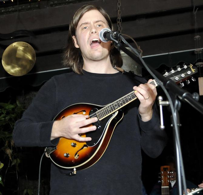 Local musician Joel Willson plays Friday, Feb. 15, 2013 during Spontaneous Combustion at the Stockade Bed &amp; Breakfast on Highland Road.
 