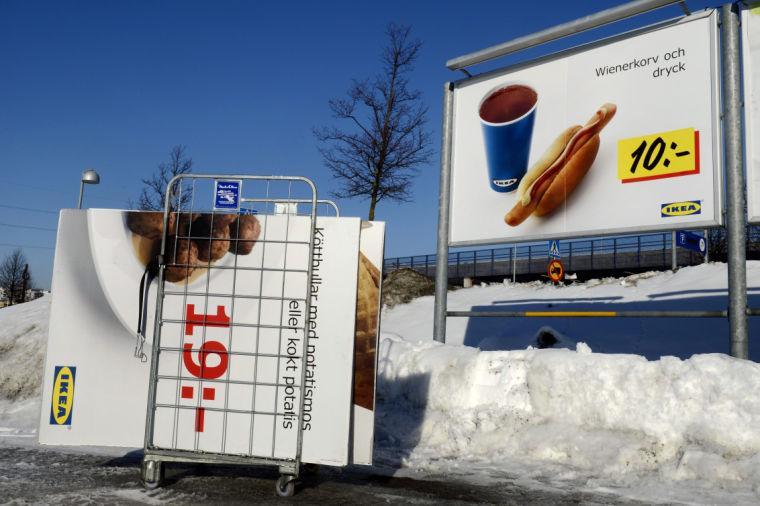 CAPTION ADDITION, ADDS FURTHER INFORMATION RELATING TO IKEA'S WITHDRAWAL OF SAUSAGES - FILE - In this Monday, Feb. 25, 2012. file photo advertising billboards for Ikea meat balls are taken down as an advertising billboard showing a hot dog are seen in a parking at the Ikea store in Stockholm, Sweden. After withdrawing meatballs from stores across Europe, home furnishings giant Ikea on Wednesday Feb. 27. 2013 said it would also pull wiener sausages made by the same supplier after its own tests confirmed "a few indications of horse meat." No horse meat had been found in the wieners, which are made of ground pork and beef, but they were removed anyway because they came from the same supplier as the meatballs, company spokeswoman Ylva Magnusson said. (AP Photo/Jessica Gow, File) SWEDEN OUT
 