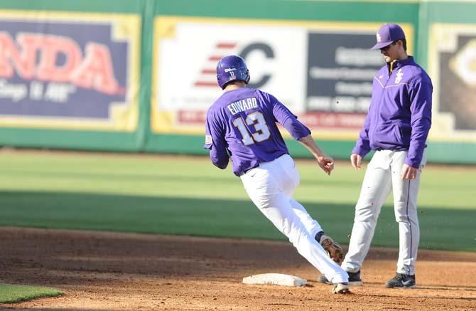 LSU senior outfielder Alex Edward runs to second base during practice on Friday, Feb. 1, 2013 at Alex Box Stadium.
 