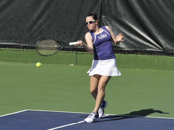 LSU senior Keri Frankenberger hits the ball during the Lady Tigers' tennis match against Southern Miss University on Saturday, Feb. 2, 2013 in W.T. "Dub" Robinson Stadium.
 