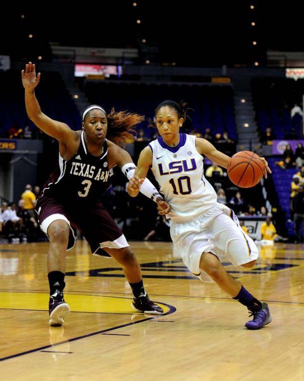 LSU senior guard Adrienne Webb is blocked by Texas A&amp;M center Kelsey Bone Monday, Feb 4, 2013. The game was a 57-74 loss against the Aggies.
 