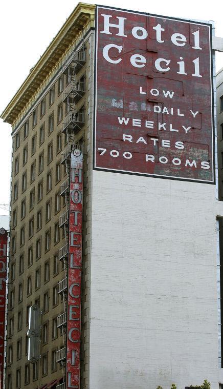 Hotel Cecil in Los Angeles is seen in a Wednesday Feb. 20,2013 photo. Police say the body of a woman found Tuesday wedged in a water tank on the roof of the Hotel Cecill is that of a missing Canadian guest. Investigators used body markings to identify 21-year-old Elisa Lam, police spokeswoman Officer Diana Figueroa said late Tuesday. A maintenance worker at the Cecil Hotel found the body earlier in the day after guests complained of low water pressure. (AP Photo/Nick Ut)
 