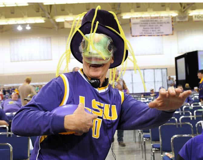 New Orleans resident Dan Frisard shows off his tiger spirit at the Bayou Bash Football Recruiting Party on Feb. 6, 2013, at the Baton Rouge River Center.
 