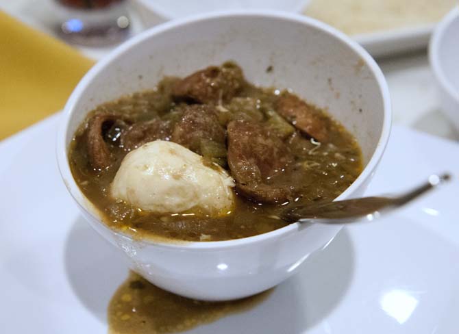 A bowl of steaming hot gumbo overflows onto the plate during the final portion of the gumbo Viking cooking class at the Hilton Hotel on Jan. 31, 2013.
 