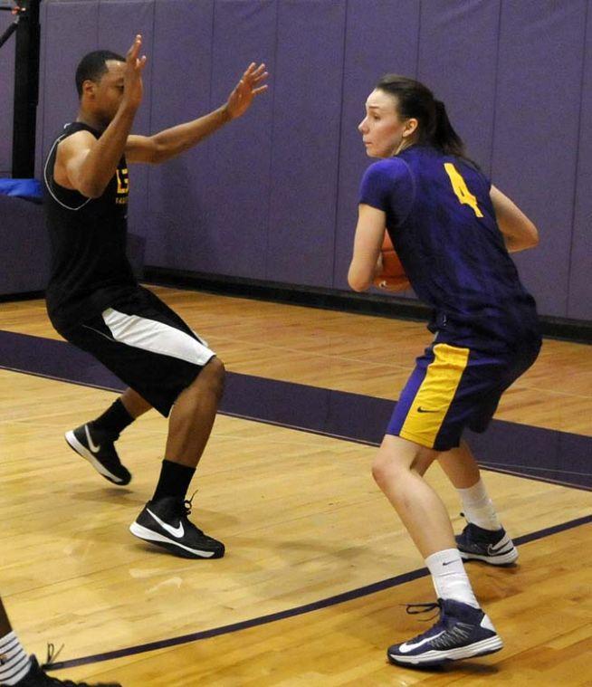 Practice players spend time improving Lady Tigers skills