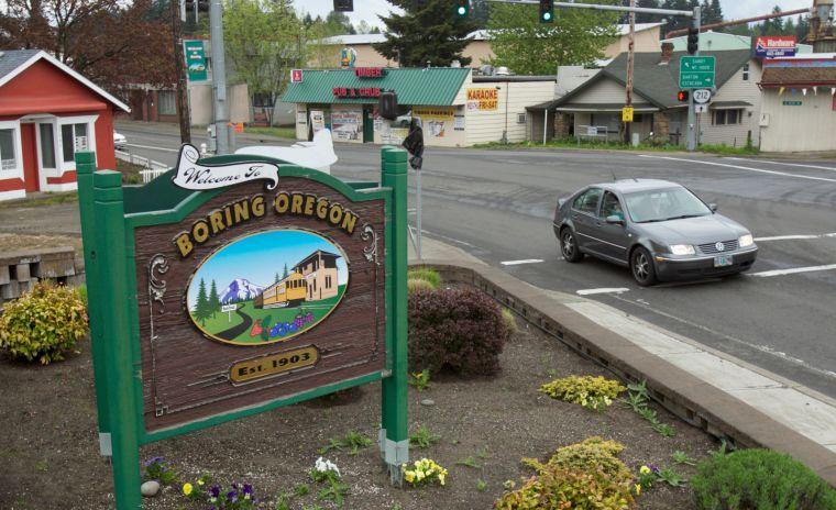 In this April 25, 2012 photo, traffic flows through Boring, Ore on the Clackamas- Boring Hwy. Boring and Dull created some excitement at the Oregon Legislature on Wednesday, Feb. 20, 2013. Last year the communities of Boring, Ore. and Dull, Scotland formed a partnership, based on their snoozy names. On Wednesday, the Oregon House voted to celebrate that partnership by making Aug. 9 Boring and Dull Day. (AP Photo/The Oregonian, Doug Beghtel) MAGS OUT; TV OUT; LOCAL TV OUT; LOCAL INTERNET OUT; THE MERCURY OUT; WILLAMETTE WEEK OUT; PAMPLIN MEDIA GROUP OUT
 