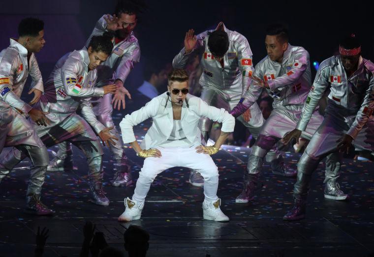 Canadian singer Justin Bieber performs at the o2 Arena in east London, Friday, March 8, 2013. (Photo by Joel Ryan/Invision/AP)
 