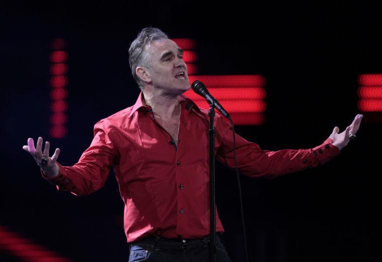 FILE - In this Friday, Feb. 24, 2012 file photo, England's singer Morrissey performs at the 53rd annual Vina del Mar International Song Festival in Vina del Mar, Chile. Animal rights activist and singer Morrissey said he&#8217;s canceled an appearance Tuesday, Feb. 26, 2013, on Jimmy Kimmel&#8217;s talk show because cast members of A&amp;E&#8217;s &#8220;Duck Dynasty&#8221; also were scheduled to appear. (AP Photo/Jorge Saenz, File)
 