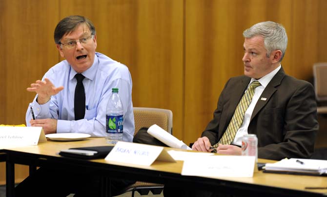 LSU Chief Information Officer Brian Nichols (right) listens attentively as Center for Computation and Technology director Joel Tohline (left) addresses the rest of the Technology and Operations subcommittee during their meeting Thursday Feb. 21, 2013 in Efferson Hall.