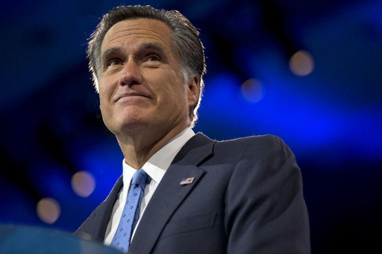 Former Massachusetts Gov., and 2012 Republican presidential candidate, Mitt Romney pauses while speaking at the 40th annual Conservative Political Action Conference in National Harbor, Md., Friday, March 15, 2013. (AP Photo/Jacquelyn Martin)
 