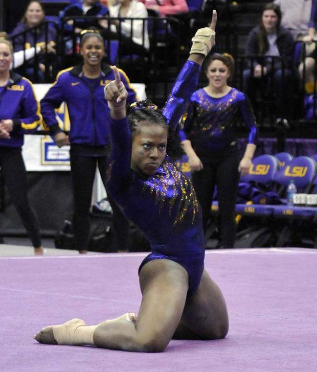 LSU sophomore all-around Lloimincia Hall finishes her floor routine March 1, 2013 during the Tigers' 197-196 win against Georgia in the PMAC.
 