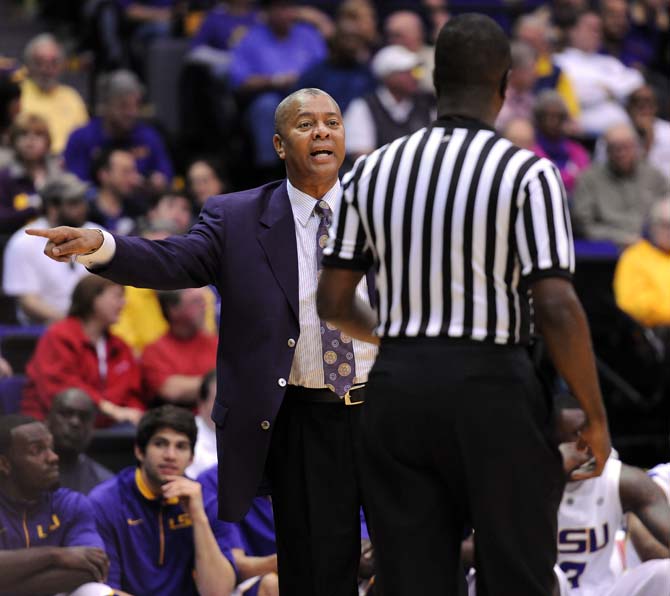 LSU men's basketball head coach Johnny Jones argues with a referee March 9, 2013 during the Tigers' 67-81 loss to Ole Miss in the PMAC.
 