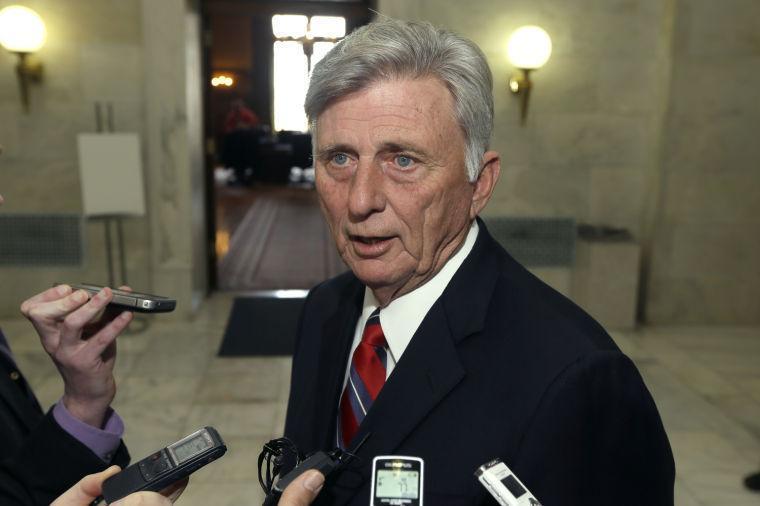 FILE - In this Monday, March 4, 2013 file photo, Gov. Mike Beebe speaks to reporters in a hallway at the Arkansas state capitol in Little Rock, Ark. after vetoing legislation that would have banned abortions 12 weeks into a pregnancy. By adopting the nation's toughest abortion law in the face of certain legal challenge, Arkansas legislators have exposed sharp tactical divisions within the national anti-abortion movement. The Arkansas ban - which would make exceptions in cases of rape, incest and certain medical contingencies - is scheduled to go into effect 90 days after the current legislative session adjourns. Beebe had vetoed the measure, but was overridden on Wednesday, March 7, 2013. (AP Photo/Danny Johnston)
 