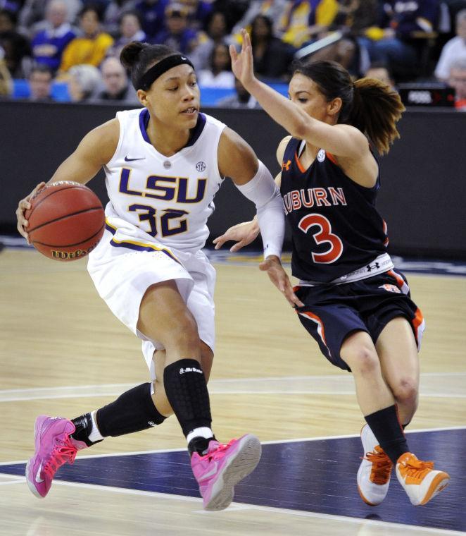 LSU guard Danielle Ballard (32) drives on Auburn guard Najat Ouardad (3) during the first half of an NCAA college basketball game in the Southeastern Conference tournament, Thursday, March 7, 2013, in Duluth, Ga. (AP Photo/John Amis)
 