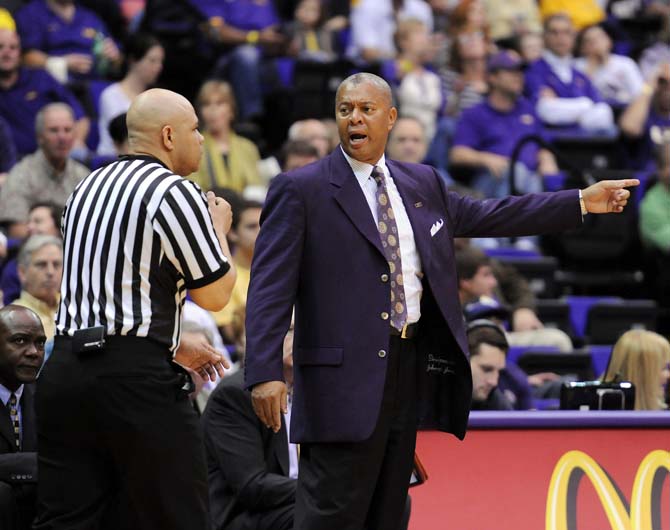 LSU men's basketball head coach Johnny Jones argues with a referee March 9, 2013 during the Tigers' 67-81 loss to Ole Miss in the PMAC.
 